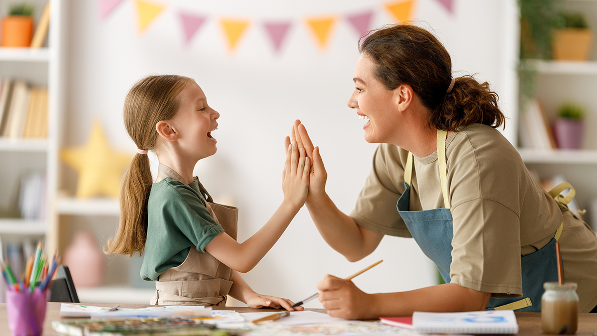Can You Teach A Dog To Do The Dishes? A Certified Dog Trainer Weighs In